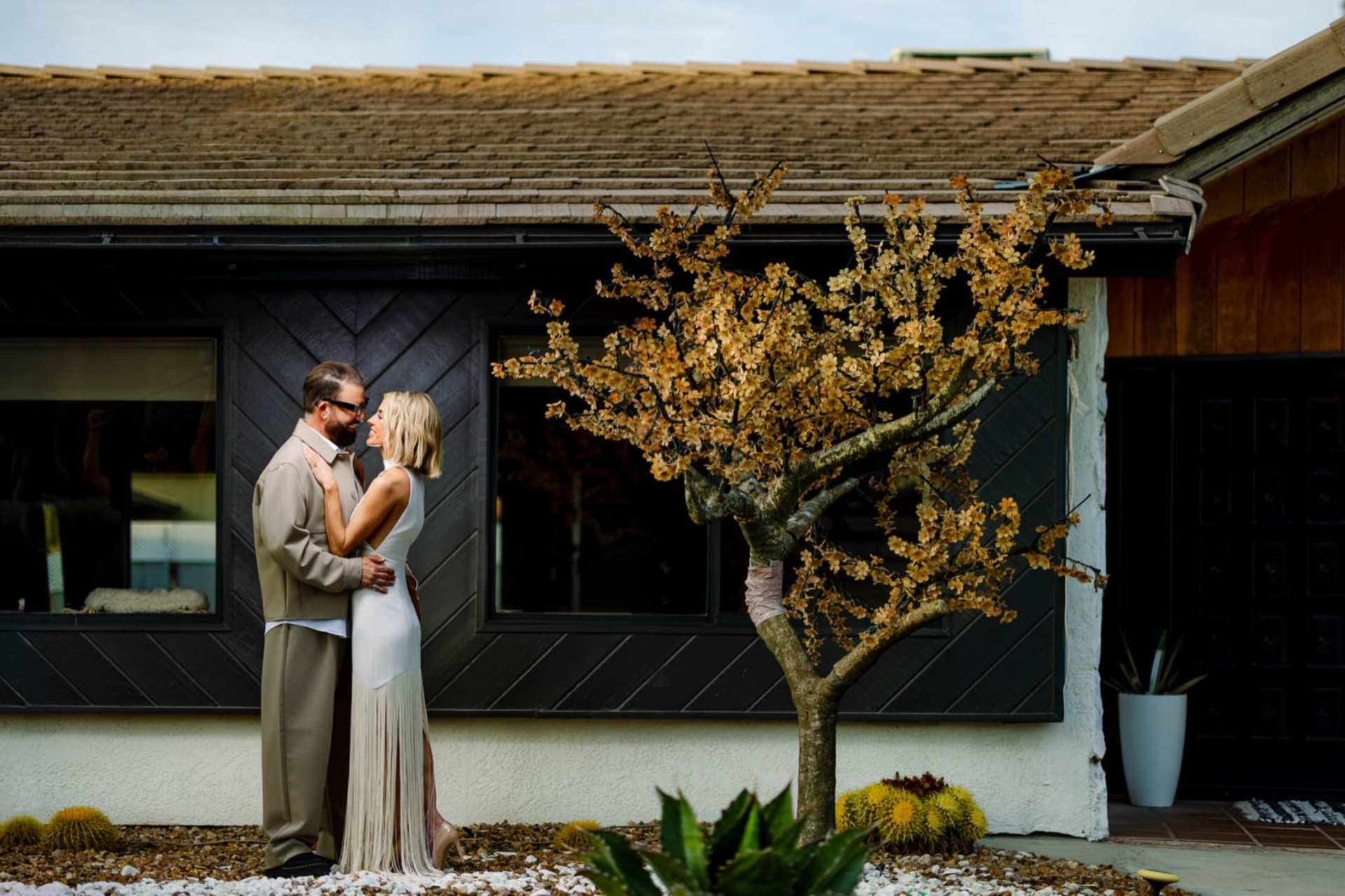 Embracing by the desert house